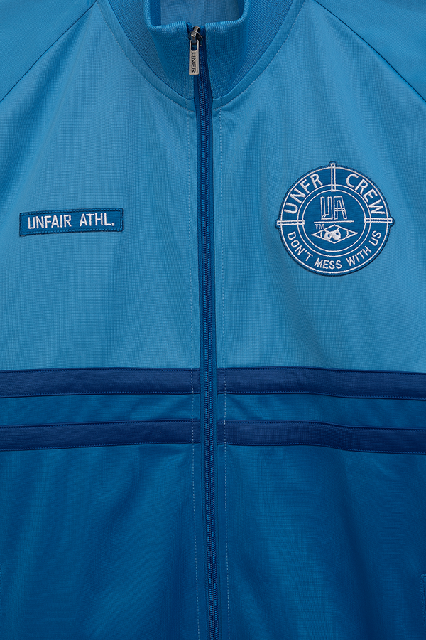 UNFAIR ATHLETICS DMWU Tracktop | Royal / Skyblue