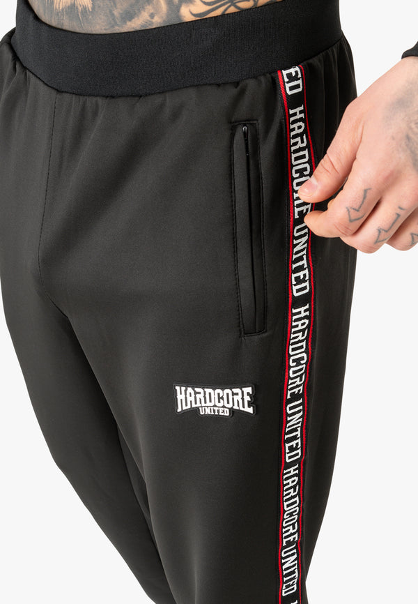 HARDCORE UNITED Trainingsanzug "Raver" | Schwarz