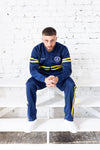 UNFAIR ATHLETICS DMWU Tracktop | Blue / Yellow
