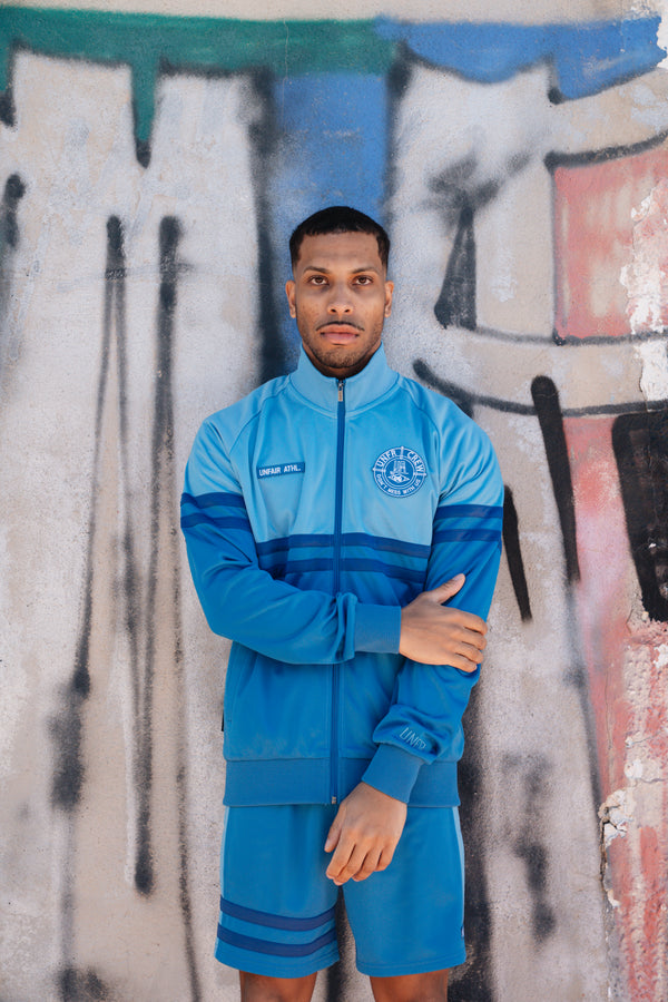 UNFAIR ATHLETICS DMWU Tracktop | Royal / Skyblue